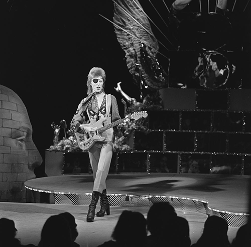 guerrillaoperator:  David Bowie shooting the video for “Rebel Rebel” on TopPop, ‘74. 