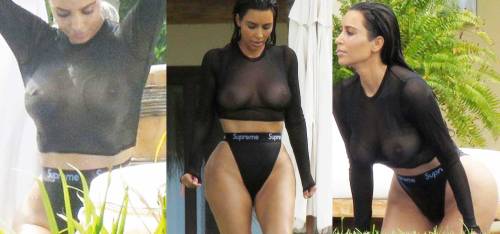 starprivate:  Kim Kardashian does seethroug topless boobs (uncensored)  Kim felt like flashing her massive topless boobs and distoted ass today.