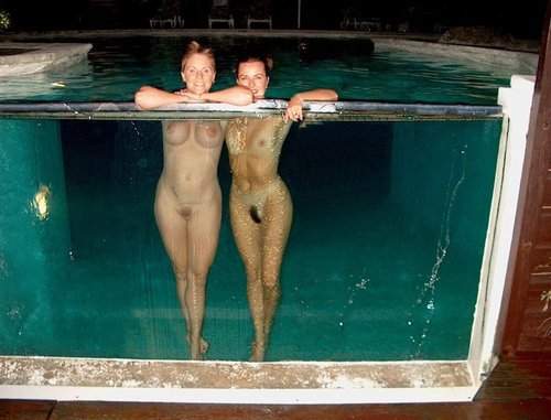 Naked skinny dipping in a pool