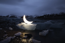 awkwardsituationist:  for ten years now, leonid tishkov has traveled the world with his moon. here we see him in arctic svalbard magdalene fjord (1,5,7), new zealand, near rangitito (second photo, taken by marcus williams), the tian shang observatory