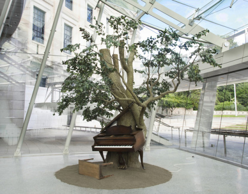 In Sanford Biggers’s Blossom, a piano fused with a tree plays “Strange Fruit” (in an arrangement by 