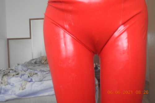 red latex catsuit