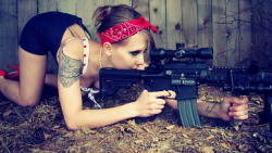 girlandguns:  Girl With Gun  http://girls-andguns.blogspot.com/
