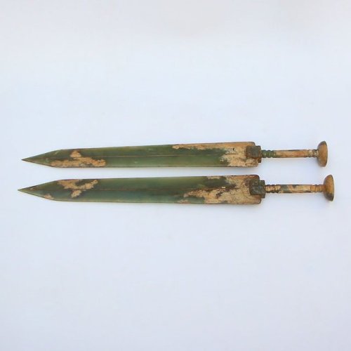 peashooter85: A pair of ceremonial Chinese jade swords, Han Dynasty (206 BC - 220 AD) from Quan Rong