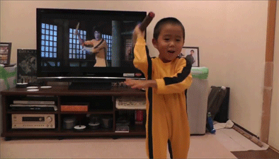 kungfucenter:A little boy plays Nunchaku like a little Bruce Lee. Nunchaku is one