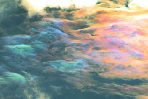 opticallyaroused:  awkwardsituationist:  cloud iridescence — caused as light diffracts through tiny ice crystals or water droplets of uniform size, usually in lenticular clouds — photographed by rolf kohl. (more cloud pics)  