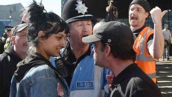 micdotcom:  Photo of young woman smiling down at far-right protester in England goes viralAs citizens around the world face the threat of far-right extremism, one photo from a demonstration in England has captured one woman’s defiance in the face of