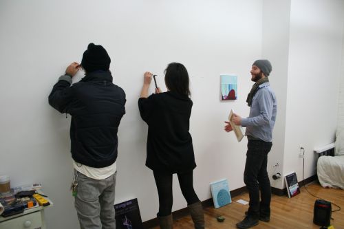 The Associated team and artist Jacob Cartwright transitioning the gallery from Weeknights, and prepa