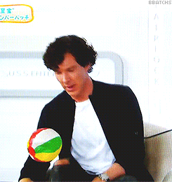 benedictcumberbatchsgirlfriend:  sexual orientation: benedict wearing black ripped jeans, playing with a ball with messy curly hair 