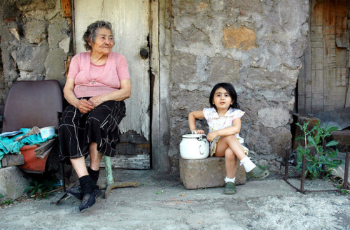 colombik:
“ At the corner of Teryan and Northern Avenue, a Soviet era building has the air of festivity adorning its façade. Flags and banners sway from wrought iron balconies in the early summer breeze. Approaching the structure, a more sobering...