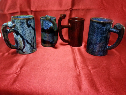 bent penis ceramic mugs. I made for a custom order for a urologist. The bent penises represent a con