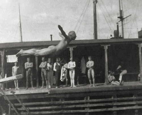 vintagemusclemen:Jansson himself is diving in front of a group of observers in this photograph.