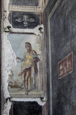 commiepinkofag:Priapus, the god of fertility and abundance, with a scale and bag of money, depicted on the wall of an ornate house owned by two men in ancient Pompeii — freed slaves and wine merchants, Aulus Vettius Restitutus and Aulus Vettius Conviva.