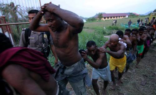 Please Share this photo as widely as possible.  This is Indonesia in Papua. Black people are st