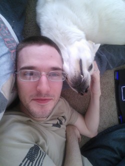 My husband and my dog lying in my lap. Look