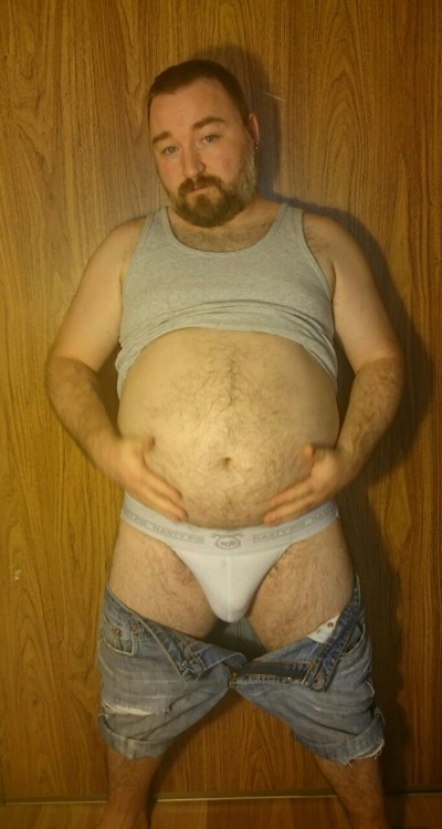 cuddlecubottawa:  I had a request for seeing me model in my favourite outfit. Somehow if was deleted but I took some pics anyways. This tank top is a bit tight around the belly, it makes me feel fat and I like that. These Jean shorts are probably the