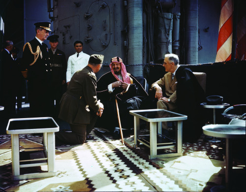 Franklin Roosevelt and King Abdul Aziz Ibn Saud of Saudi Arabia meet aboard the USS Quincy, on this 