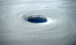 spaceexp:  The eye of Super Typhoon Vongfong is 80 km across. Looks very dark in there. via reddit 