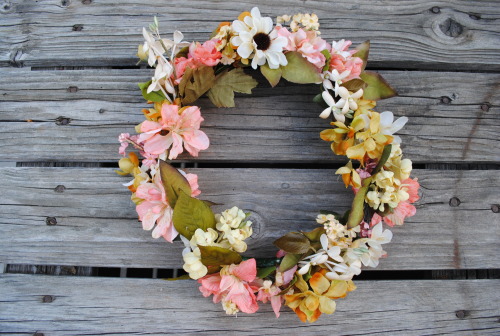 Another flower crown I’m selling on my Etsy store! This one is pink and yellow with little white dai