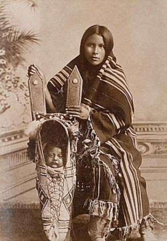 Old photograph of a Kiowa mother and child.