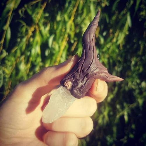 Made another pendant for my store sculped antler horn with raw quartz crystal  Horn is made with pol