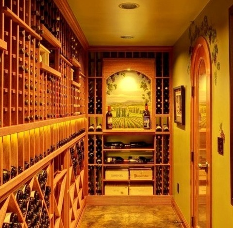 Mediterranean Wine Cellar In SeattleHuge Tuscan Concrete Floor And Yellow Floor Wine Cellar Photo With