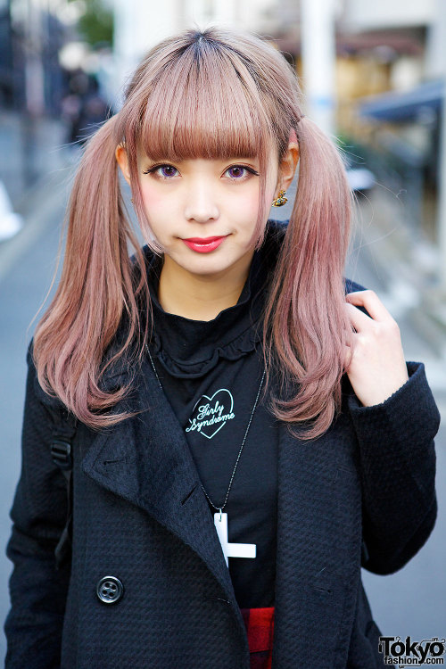 Twin Japanese sisters Mim (right, pink hair) and Mam (left, darker hair) on the street in Harajuku w