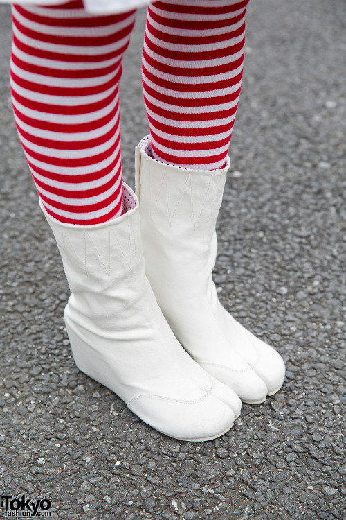 tokyo-fashion:  Mai on the street in Harajuku wearing a cropped sweatshirt over a Nincompoop Capacity dress, Sou Sou tabi boots, and a randoseru. Full Look