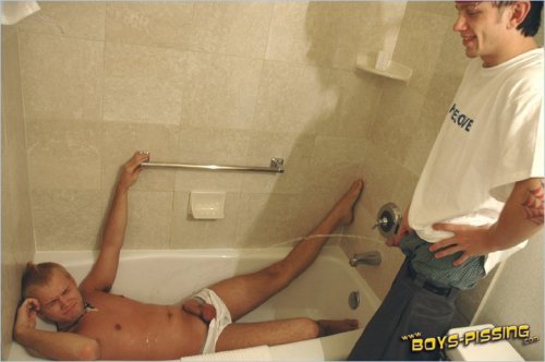 boys-pissing:  Straight pissing on gay! Not to worry no gay boy was harmed during this photo shoot lol! Ian Maddrox had to go and he does all over the bath tub and the model inside the tub!