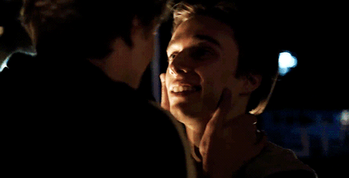 Eliott + Holding Lucas Face While Kissing Him