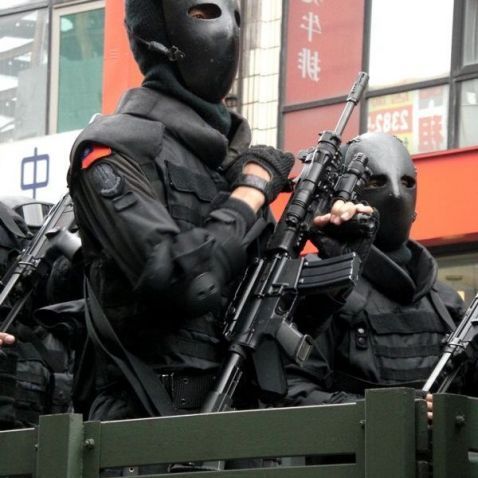 Black MaskTaiwanese soldiers with an interesting, if not intimidating piece of equipment.