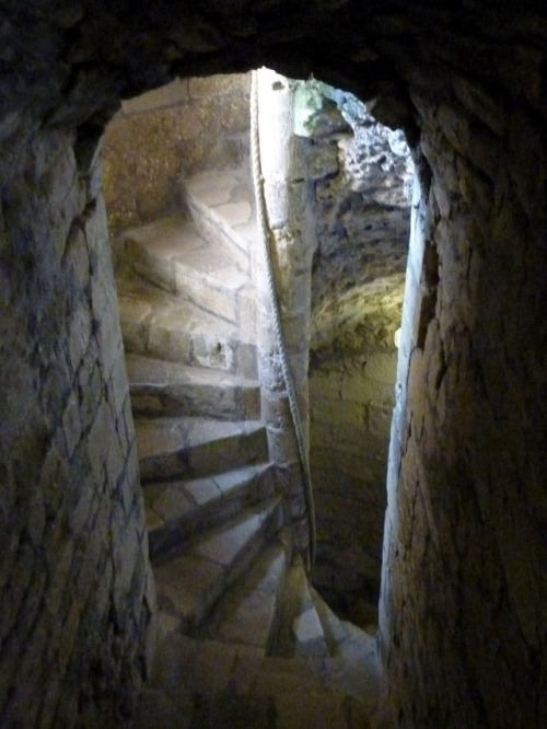 Spiral staircase in the north-west corner Porchester Castle keep(Hampshire, England).  Porchester Ca