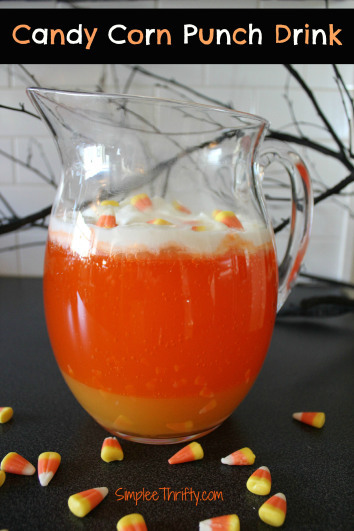 DIY Candy Corn Punch Recipe from Simplee Thrifity. This is a combination of mango, orange soda and w