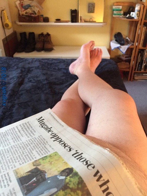 Relaxing with the newspaper