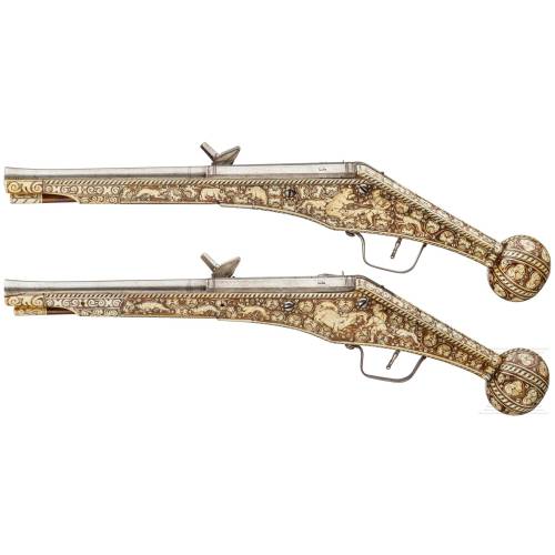 A pair of bone inlaid wheel-lock pistols crafted by Peter Daner of Nuremberg, Germany, dated 1587fro