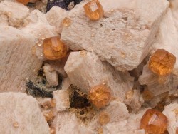 ifuckingloveminerals:  Spessartine, MicroclineWushan