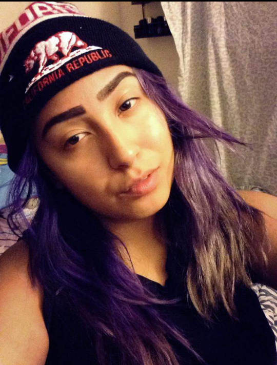 My purple hair is fading. This is the first picture after I recently re shaped my