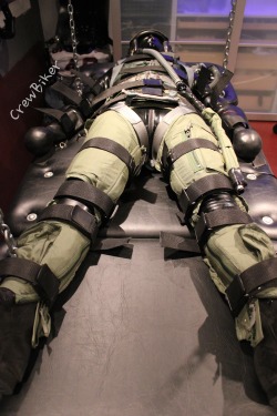 maxatl:  crewbiker:  Inflating the anti-shock trousers ensured that the restrained boy really knew he wasn’t going anywhere while forcing even more blood to his throbbing cock trapped inside his catsuit.  Nice! 