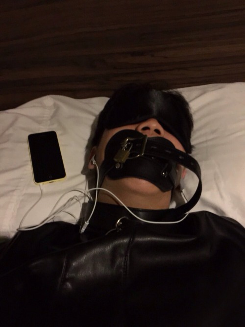 Spreadeagled, blindfolded, gagged, forced to listen to porn.