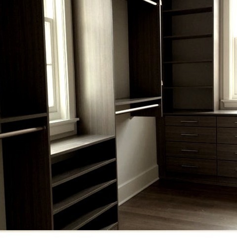 Walk-In Closet ChicagoInspiration For A Mid-sized Farmhouse Gender-neutral Medium Tone Wood Floor Walk-in
