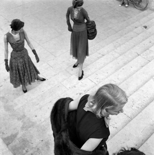 René Burri (Swiss; 1933– )Models (New Look Silhouettes) Posing for a Photographer at a Fashion Shoot