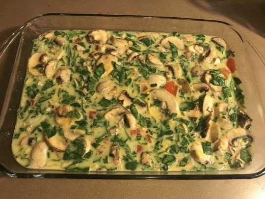 fitnesswholeburgerinmymouth:Vegetable Egg Breakfast Casserole2-3 handfuls of baby spinach chopped up1 cup of sliced fresh mushrooms1 whole tomato¼ yellow onion2 tbsp garlic powder1 tbsp crushed red pepper2 cups of milk18 eggsTurn the oven to 400