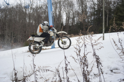 Racers fighting their way up the snow. Appalachian Moto Jam. 