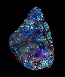 geologypage:  Large Boulder Opal | #Geology #GeologyPage #Mineral  Locality: Queensland, Australia  Size: 7.5 x 6.0 x 1.5cm  Photo Copyright © Bonhams  Geology Pagewww.geologypage.com