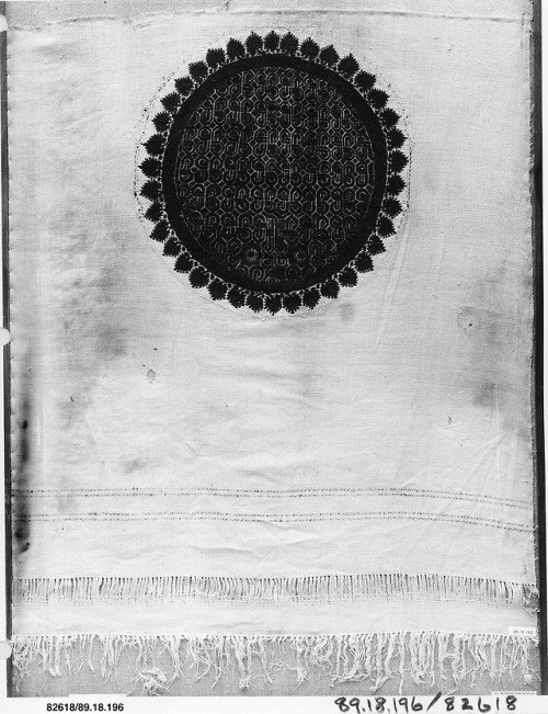 Fragment with an Interlace Medalion Bordered by Vine Leaves, Islamic ArtMedium: Wool, linen; plain w