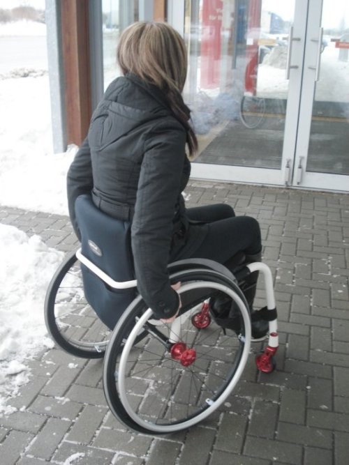 Beautiful paraplegic women with boots on.