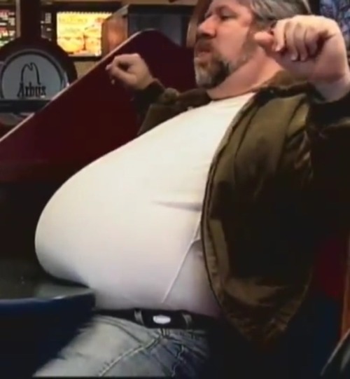 bigdrmr:  schlago:  twinkforbears331:  “A man ain’t ‘sposed to be scrawny, son. I’m proud of this big gut.”  Super belly nice  Those are screencaps from “Hard Fat”, the gainer documentary film. And what a good choice of model!