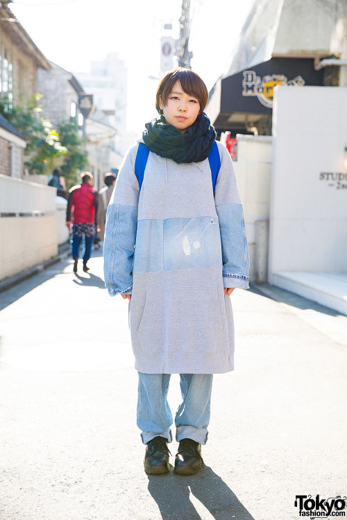 20-year-old Sachiko on the street in Harajuku wearing an oversized sweatshirt from the Japanese bran