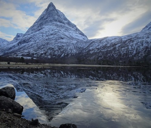 Mountain, reflection, floating ice by travelling_slonik Innerdalstårnet is a 1,452-metre (4,76