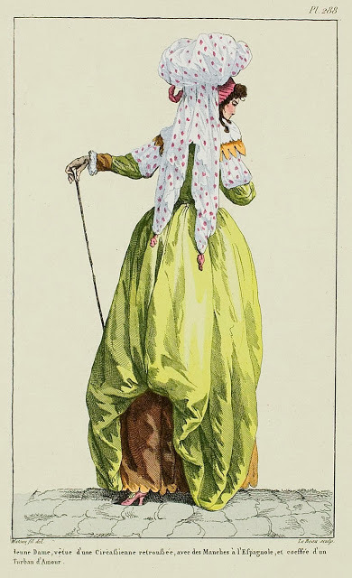 Magasin des ModesYoung élégante dressed in a pierrot with pockets and redingote sleeves, plain musli